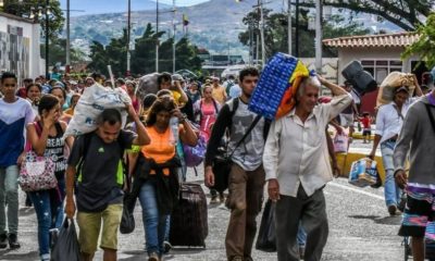 Venezolanos emigran - ACN